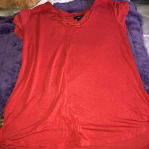 red shirt with pull strings on the neck